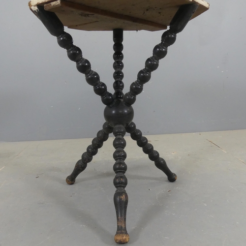 2308 - An antique painted pine Gypsy table, the circular top on bobbin turned tripod base. Diameter 52cm, h... 