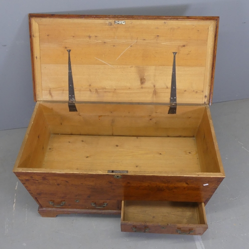 2310 - A vintage stained pine blanket box, with lifting lid, two drawers under and raised on bracket feet. ... 