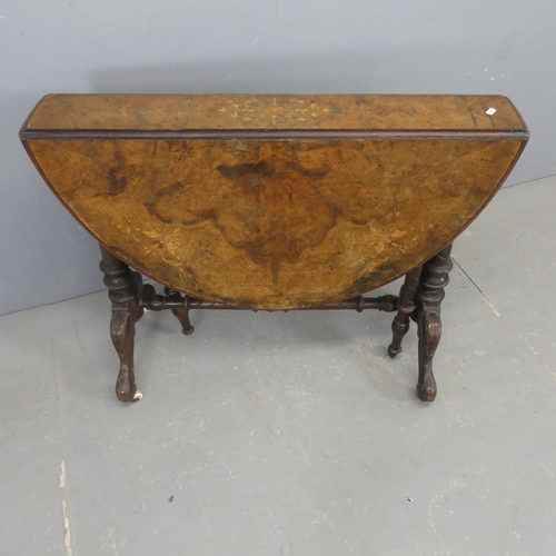 2311 - A Victorian burr-walnut veneered oval Sutherland drop-leaf table with inlaid decoration and turned s... 