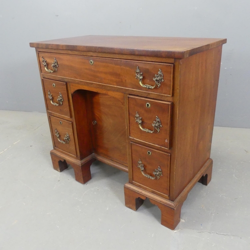 2337 - A reproduction Georgian style kneehole writing desk. Overall width 81cm, height 72cm, depth 42cm. Kn... 