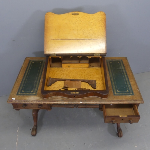 2339 - A Victorian oak writing table, with centre slope and two drawers. Width 108cm, height 94cm, depth 61... 