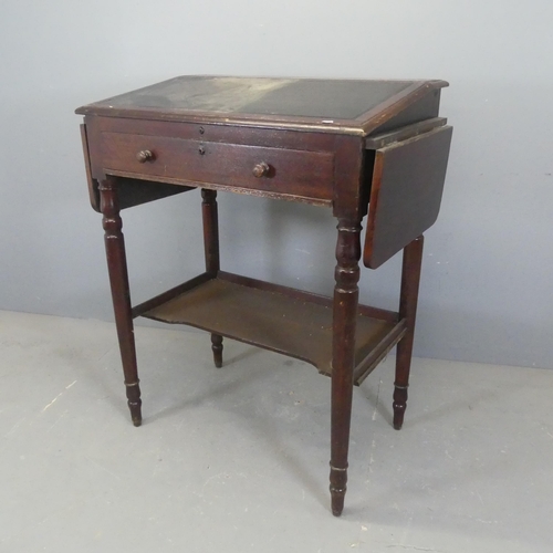 2342 - An antique oak two-tier clerk's desk, with lifting lid, drop side-leaves and raised on tapered legs.... 