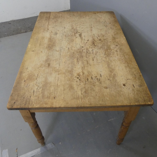 2351 - A vintage pine scrub-top farmhouse kitchen table. Length 122cm, height 73cm, width 80cm.