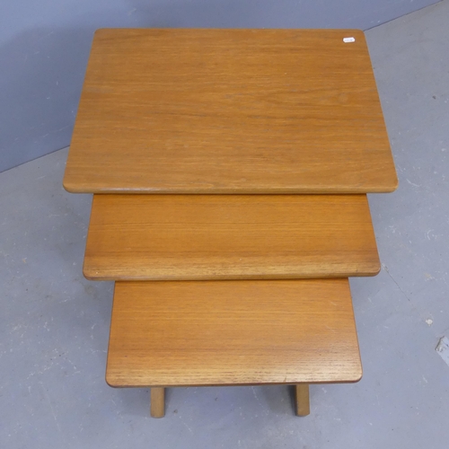 2354 - NATHAN FURNITURE - A mid-century teak nest of three rectangular occasional tables. Largest width 61c... 