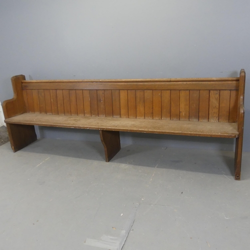 2368 - A vintage oak church pew. Length 253cm, height 90cm, depth 48cm.