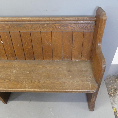 2369 - A vintage oak church pew. Length 298cm, height 90cm, depth 43cm.