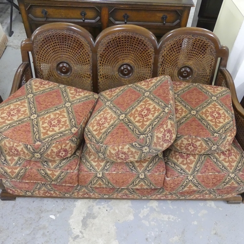 2371 - A 1930s Art Deco walnut framed three-piece Bergere lounge suite, comprising a sofa and two matching ... 