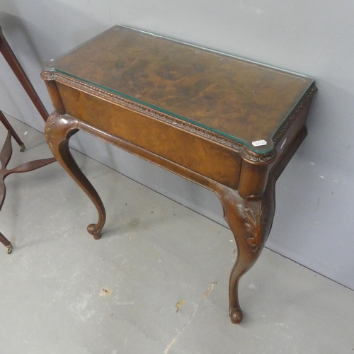 2446 - A Victorian mahogany and burr-walnut veneered console table, with carved decoration and cabriole leg... 