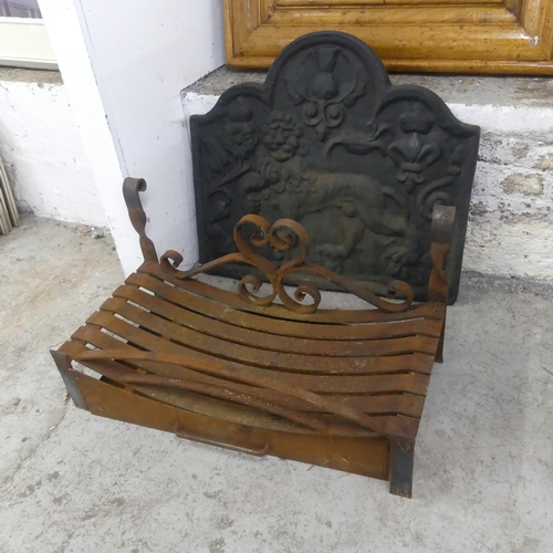 2449 - An antique cast iron fire back, width 74cm, height 67cm, and a fire grate with ember tray.