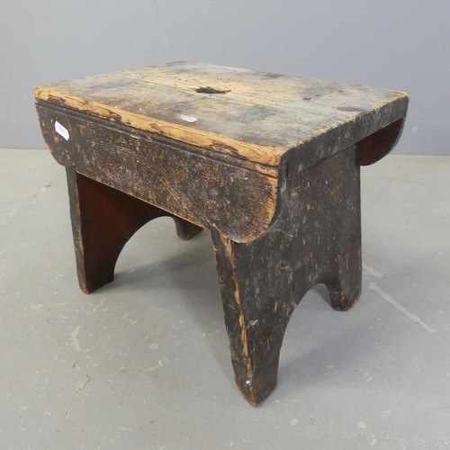 2455 - An antique stained pine footstool. Width 33cm, height 27cm, depth 23cm.