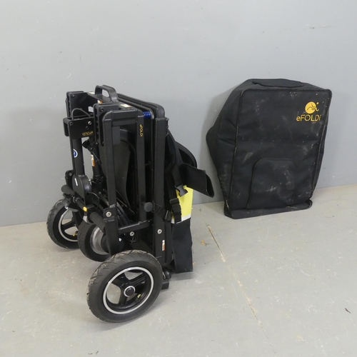 2469 - An eFoldi Lite powered folding scooter, with storage bag and backpack.