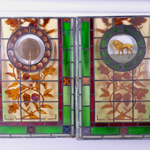 1 - A pair of Art Nouveau leadlight and coloured glass panels, a central panel depicting fruit and flowe... 