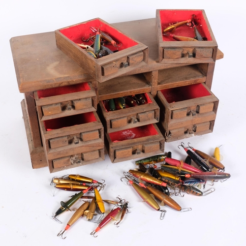 107 - A 7-drawer chest with various fishing spinners