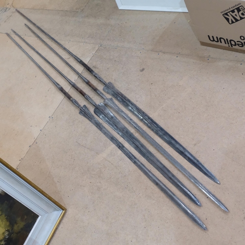 114 - 4 various double-ended steel-tipped spears, longest 218cm