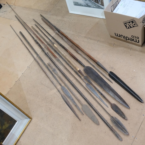 115 - A collection of various single and double-ended spears, longest 260cm