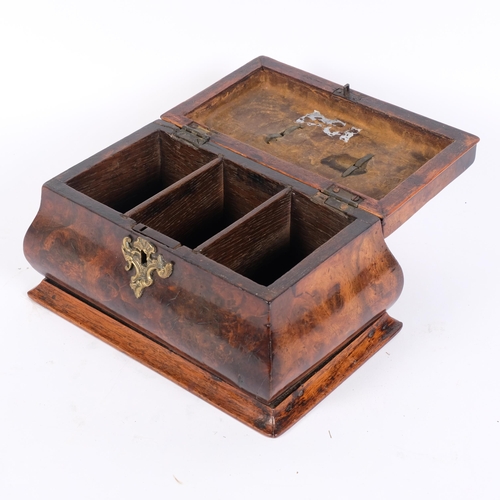 13 - A Georgian walnut caddy, with 3-sectional interior, ogee shaped form with brass swing handle, W24cm