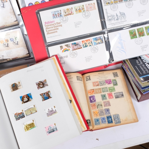 136 - A collection of philatelic brochures and magazines, stamp albums, etc