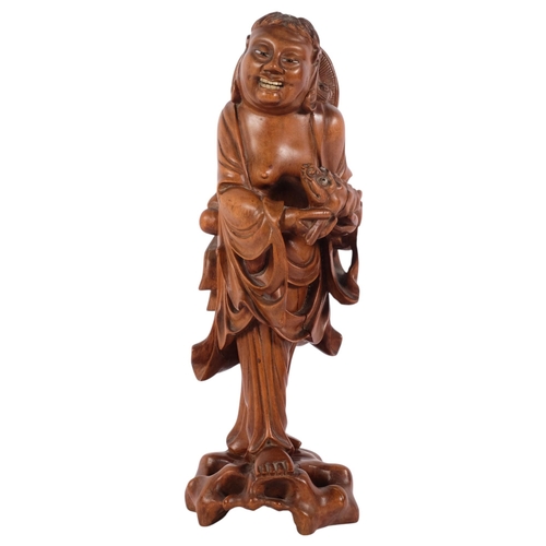 158 - A Chinese carved hardwood figure of an immortal (Liu Hai), H30cm