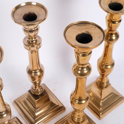 183 - 2 similar pairs of Georgian brass candlesticks, tallest 28.5cm