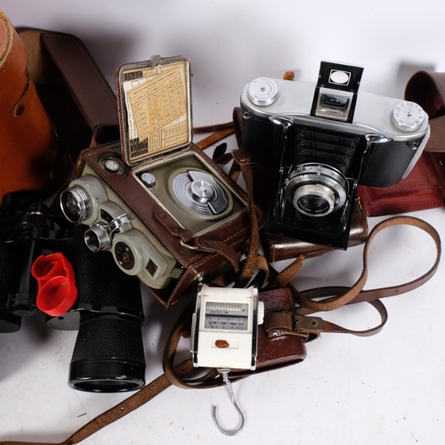 224 - An Ensign Selfix 12-20 camera, cased, Eumig cine camera, and 2 pairs of binoculars including a pair ... 