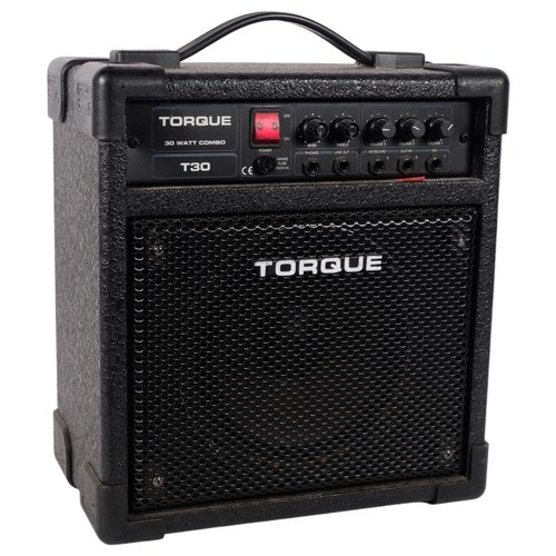 232 - A Torque T30 30 watt combo amplifier, with power cables, and a selection of modern microphones, incl... 