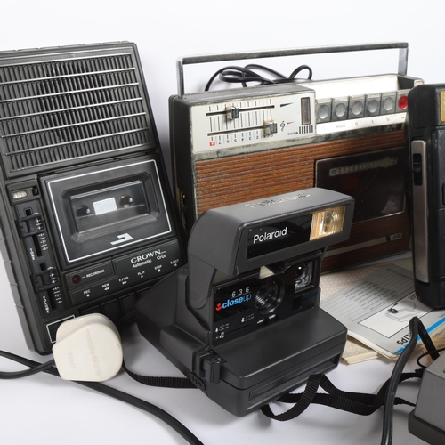 264 - A selection of Vintage cassette tape recorders, a boxed Polaroid instant camera, a Kodak EK160-EF in... 