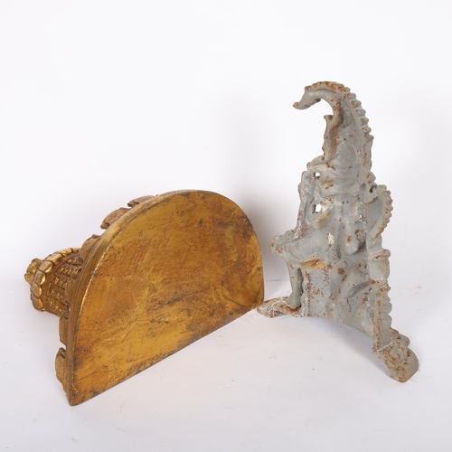 284 - A Classical style gilded wall bracket, H32cm, and a painted cast-iron Punch doorstop, 32cm (2)