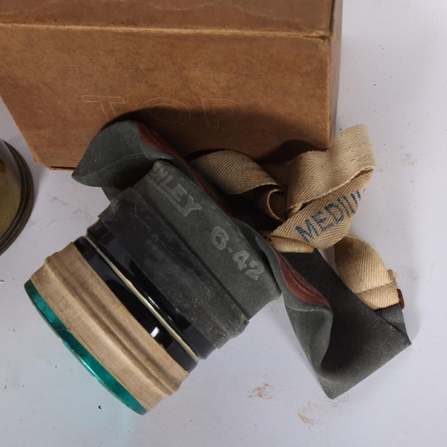 285 - A Second World War Period Type C1 general civilian anti-gas respirator, in original box, a First Wor... 