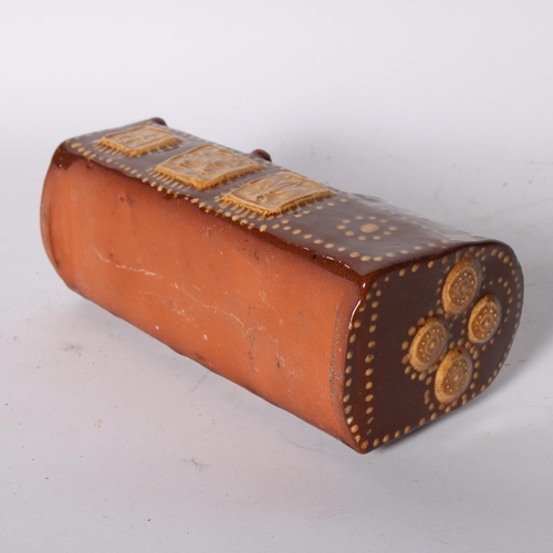 287 - A slipware model cradle, decorated in cream slip on dark brown ground, with initials IH and date 169... 