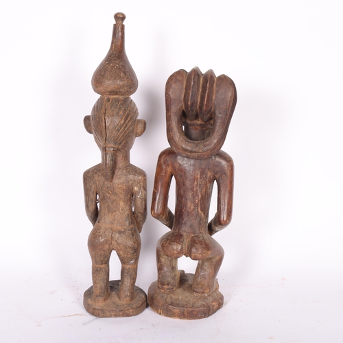 298 - 2 African Tribal carved wood fertility figures, largest 49cm (2)