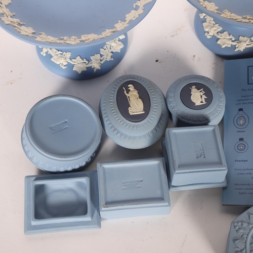 310 - A group of Wedgwood blue and white Jasperware, including pair of tazzas, trinket boxes, etc