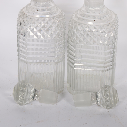 334 - A pair of Antique glass decanters and stoppers, 21cm