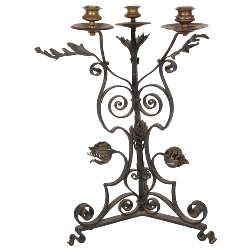 349 - A late Victorian Arts and Crafts 3-branch candelabrum in wrought-iron and brass, in the manner of W ... 