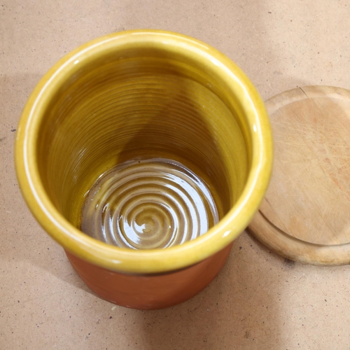 364 - A part-glazed terracotta bread crock, with wooden cover, H34cm