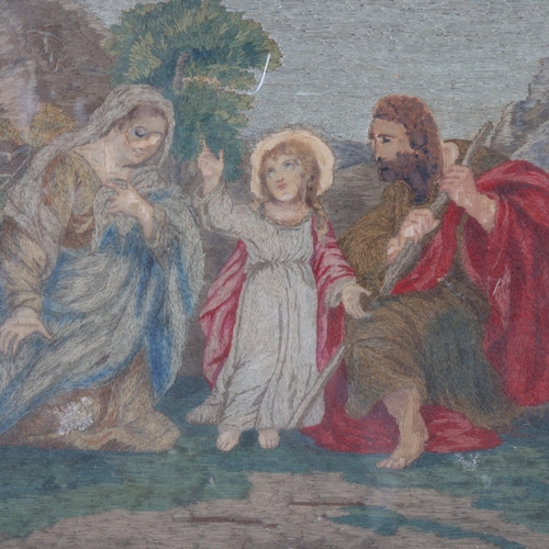 410 - An Antique framed watercolour and crewelwork study of 3 figures in a landscape, possibly Baby Jesus,... 