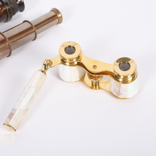 427 - 2 modern brass pocket telescopes, and a pair of mother-of-pearl opera glasses (3)