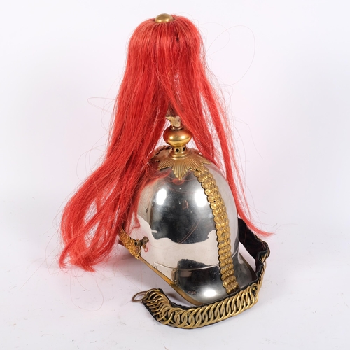 43 - A Household Cavalry Royal Horse Guards Officer's helmet, with red plume, applied brass laurel wreath... 