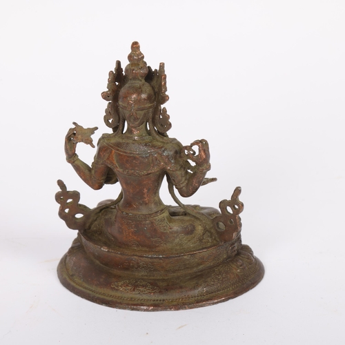 460 - A Chinese miniature bronze seated Buddha, on double lotus base, 10cm