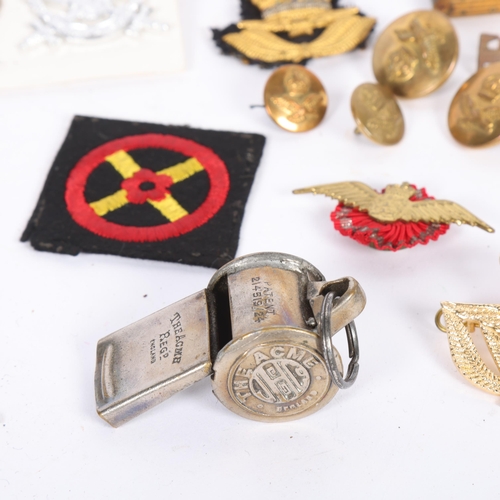 467 - Various militaria, including Royal Australian Air Force cap badges, Acme whistle, envelope, etc