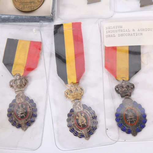 469 - A group of First and Second World War medals, including French Croix De Combatant, Belgian Labour de... 