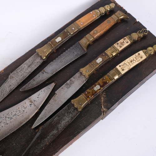 48 - A mounted display of a selection of Antique European/Middle Eastern hunting and folding knives, all ... 