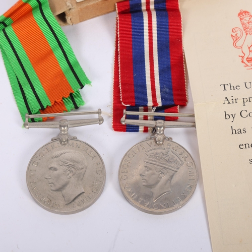 480 - A Second World War medal duo to Flight Officer V Matthews, comprising War medal and Defence medal, i... 