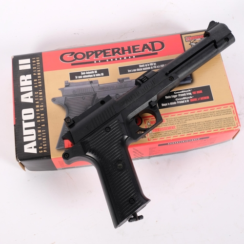 51 - A Crossman copperhead auto air to air pistol, boxed with instructions