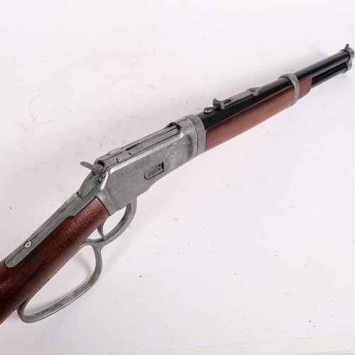 57 - A replica copy of a Winchester carbon rifle, 82cm