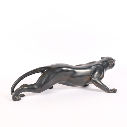 6 - A patinated resin bronze study of a jaguar, L53cm