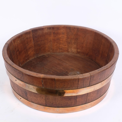 64 - A coopered oak half barrel/jardiniere stand, diameter 45cm, height 16cm