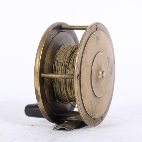 69 - A Victorian brass ratchet salmon reel, by W Gorden, Aberdeen, W3.5