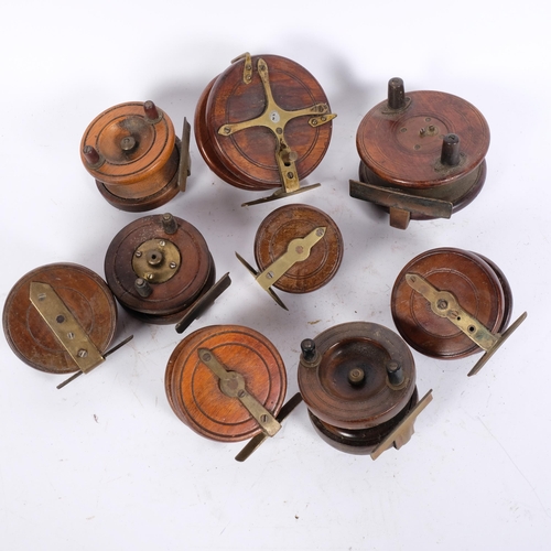 95 - A group of Vintage wooden fishing reels, including 2 x 4