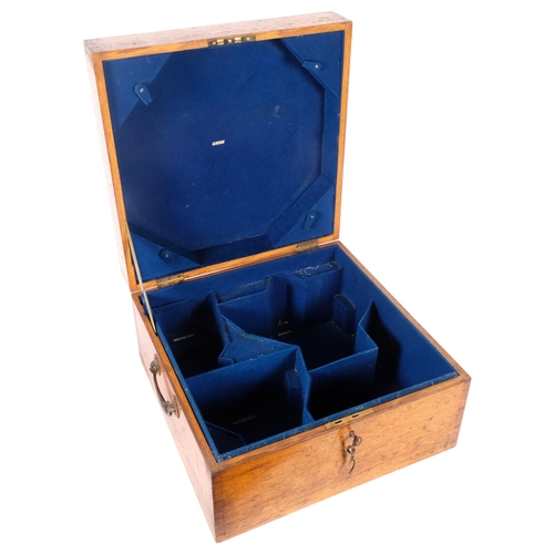 550 - An Antique oak tea set case, with brass inset armorial plaque