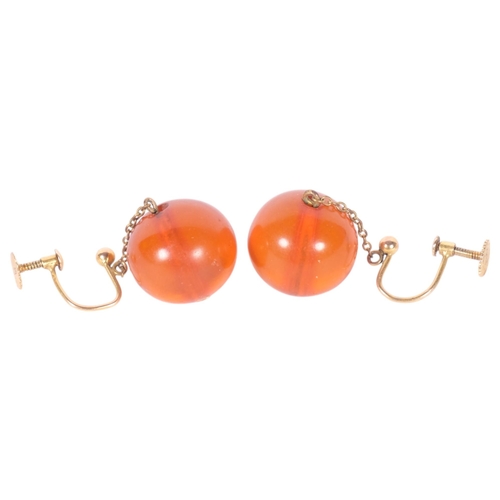 564 - A pair of 9ct gold amber drop earrings, 4.4g